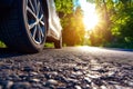 Car Asphalt Road Motion Summer Time, Summer tires on the asphalt road in the sun time Royalty Free Stock Photo