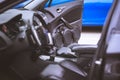 Car Audio System Speakers in the Open Door. Blurred Car Leather Interior Royalty Free Stock Photo