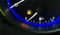 Car auto dashboard fuel gauge showing out of gas empty fuel tank Royalty Free Stock Photo