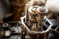 Car automatic transmission gear part on workbench in garage Royalty Free Stock Photo