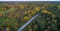 Car on a autumn color road 01