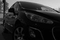 Car in the back of a hatchback in the evening on the background of the evening city. car in the scenery of the city. long exposure