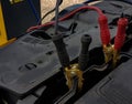 Car battery charging cords background