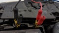 Car battery charging cords background