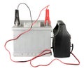 Car battery with two jumper cables clipped to the terminals isolated on white