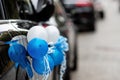 Car with blue and white balloons to bring newborn baby home from maternity hospital Royalty Free Stock Photo