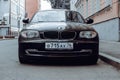 car BMW 1 series E87 on the urban parking, front view