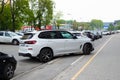 car BMW x5m parked on bike lane, sidewalk. traffic violation. Yekaterinburg, Russia - 5.23.23