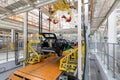 Car bodies are on assembly line. Factory for production of cars. Modern automotive industry. A car being checked before