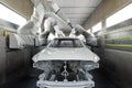 Car bodies are on assembly line. Modern automotive industry. A car being painted in a high-tech enterprise