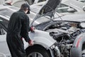 car body assembling before repair and painting in garage workshop