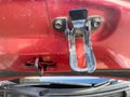 Car bonnet or hood lock system or lock latch closeup Royalty Free Stock Photo