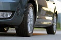 Car with brand new tires, low angle view