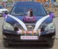 Car with bride and her mom stopped on the street