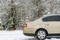 The car broke down in the winter forest. The car got stuck in the winter in the cold