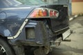 A car without a bumper. Damaged part of the transport. Car after the accident