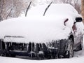 Car buried under snow after blizzard in residential area Royalty Free Stock Photo