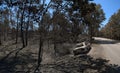 Car burnt down by a forest fire near the road - Pedrogao Grande Royalty Free Stock Photo