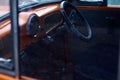 Car cab.Through glass. Black steering wheel