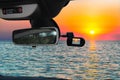 Car camera view of scenic sunset on the mediterranean sea Royalty Free Stock Photo