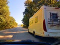 Car caravan on the road in spring moving Royalty Free Stock Photo