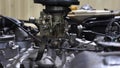 Car carburetor engine is ready for repair in a car repair shop