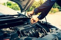 Close-up hand technician auto mechanic using the wrench to repairing change spare part car