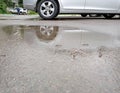 Car in the city, after the rain