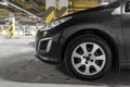 car close-up in the parking lot. a car standing in a parking space. a close-up view of the details Royalty Free Stock Photo