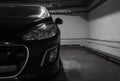 Car close-up in the parking lot. a car standing in a parking space. a close-up view of the details Royalty Free Stock Photo