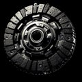 Car clutch disc on a black background, close-up