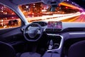 Car cockpit interior in night traffic Royalty Free Stock Photo