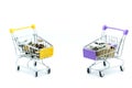 Car and coins in shopping cart,auto loan concept.