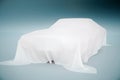 Car covered with cloth Royalty Free Stock Photo