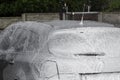 The car is covered with foam at a self-service car wash. Man washes foam machine. Carwash. Washing machine at the station Royalty Free Stock Photo