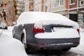 Car is covered icicles, snow and ice. Cleaning of snowdrift. Access problems. Royalty Free Stock Photo