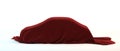 Car covered red fabric Royalty Free Stock Photo