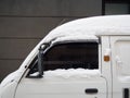 Car covered with white snow Royalty Free Stock Photo