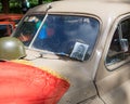 Car cowl GAZ-M-20 Pobeda with Stalin s portrait and a lying flag on show of collection Retrofest cars Royalty Free Stock Photo