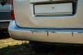 car crash or accident. Front fender and light damage and scratched on bumper. Broken vehicle detail or close up Royalty Free Stock Photo