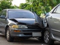 Car crash accident on street with wreck and damaged automobiles. Accident caused by negligence And lack of ability to drive. Due t Royalty Free Stock Photo