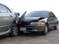 Car crash accident on street with wreck and damaged automobiles. Accident caused by negligence And lack of ability to drive. Due t