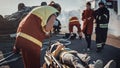 On the Car Crash Traffic Accident Scene: Paramedics Saving Life of a Little Girl Lying on Stretche Royalty Free Stock Photo