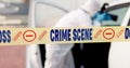 Car, crime scene and forensic photographer with camera for evidence in court, working and investigation. Adult, person Royalty Free Stock Photo