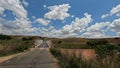 Car crosses a bridge on a bumpy road from Antsirabe to Miandrivazo in Madagascar