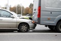 Car crushed hood bumping into truck, dangerous