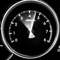 Car dashboard dials - engine RPM rotations per minute Royalty Free Stock Photo