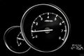 Car dashboard dials - engine RPM rotations per minute Royalty Free Stock Photo