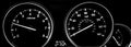 Car dashboard dials - engine RPM and speedometer Royalty Free Stock Photo