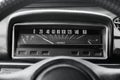 Car dashboard, illuminated panel, speed display. Black and white photo